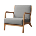 Grey fabric armchair with natural wood curved open-arm frame and separate back and seat cushions, angle view
