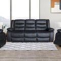 Black leather 3-seater recliner sofa in lifestyle living room with large windows and modern decor