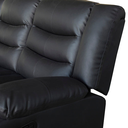 Close-up of black leather recliner sofa backrest showing quilted tufted cushion panels