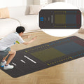 Boy crouching at start of long black jumping test mat with coloured measurement zones on wood floor with callout inset
