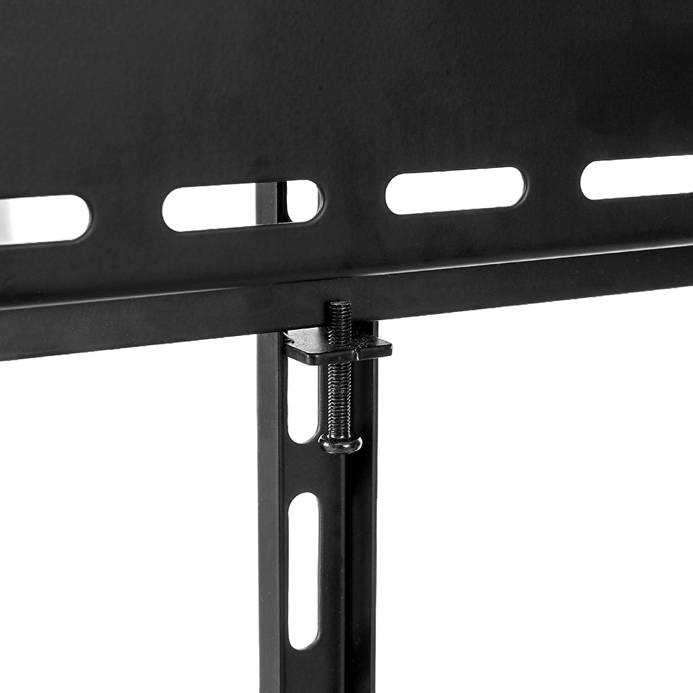 Black wide fixed TV wall bracket close-up showing lower rail T-junction with bolt and spring connector on white
