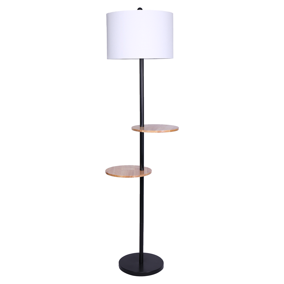 Floor lamp with two round wood shelves on black metal pole, white drum shade on top and round black base, white background