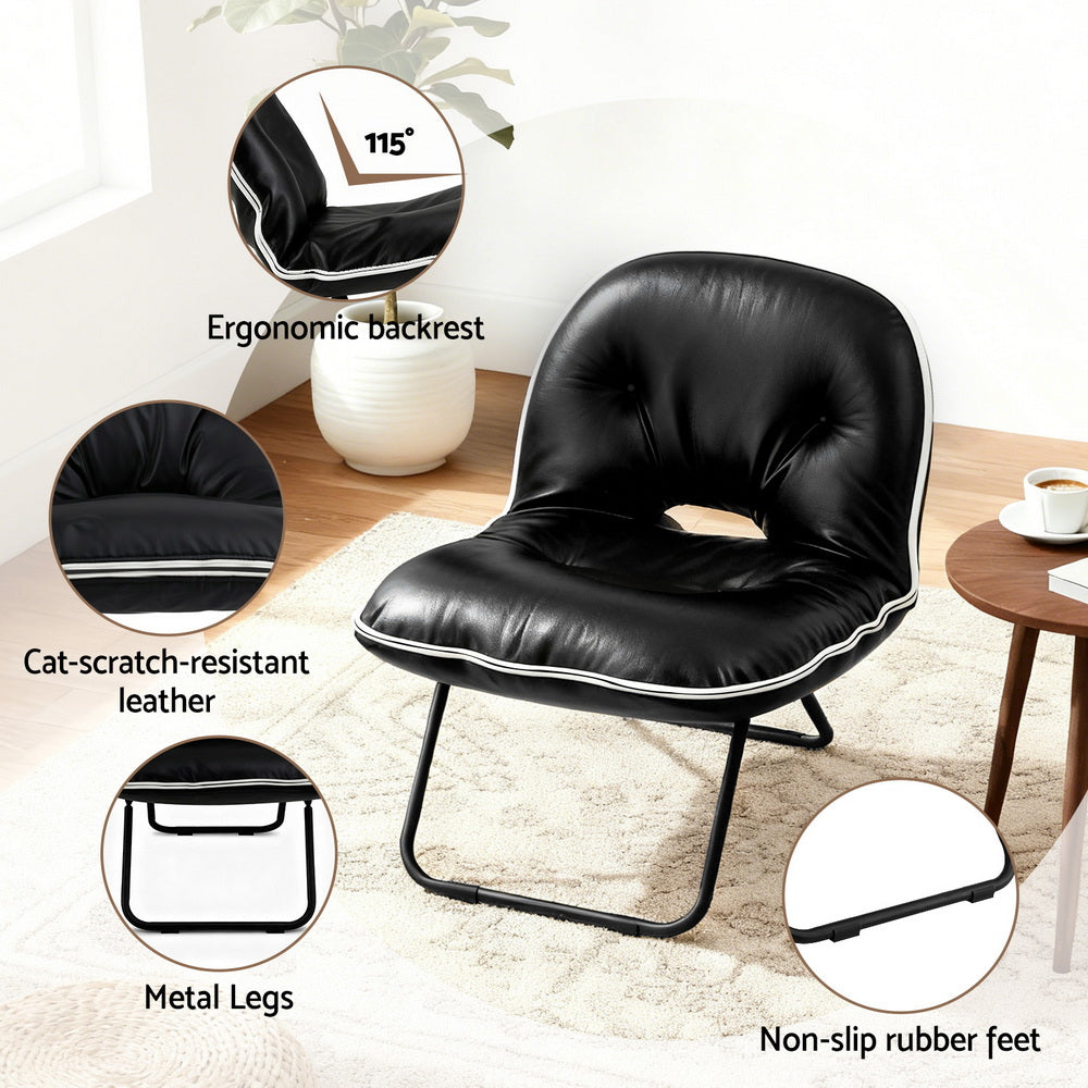 Black foldable floor chair feature callouts: 115° ergonomic backrest, cat-scratch leather, metal legs, rubber feet