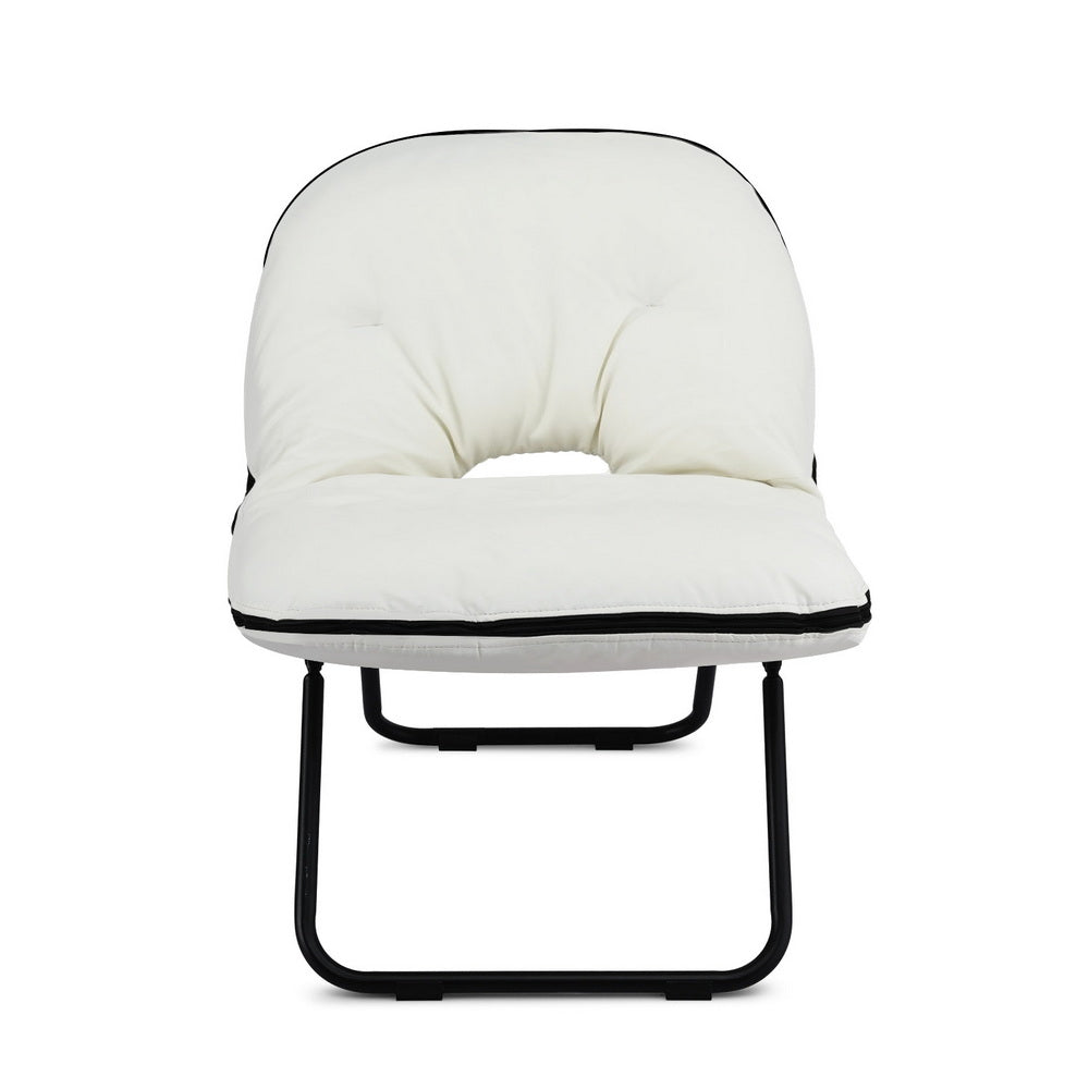 White foldable floor chair with tufted back, centre cutout, and black metal frame, front view on white background