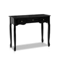 Black French provincial console table: 3 drawers with brass knobs, scalloped apron, cabriole legs, white background