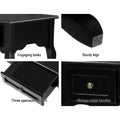 Four-panel detail collage of black console: scalloped apron, wood corner, open drawer interior, raised panel with brass knob