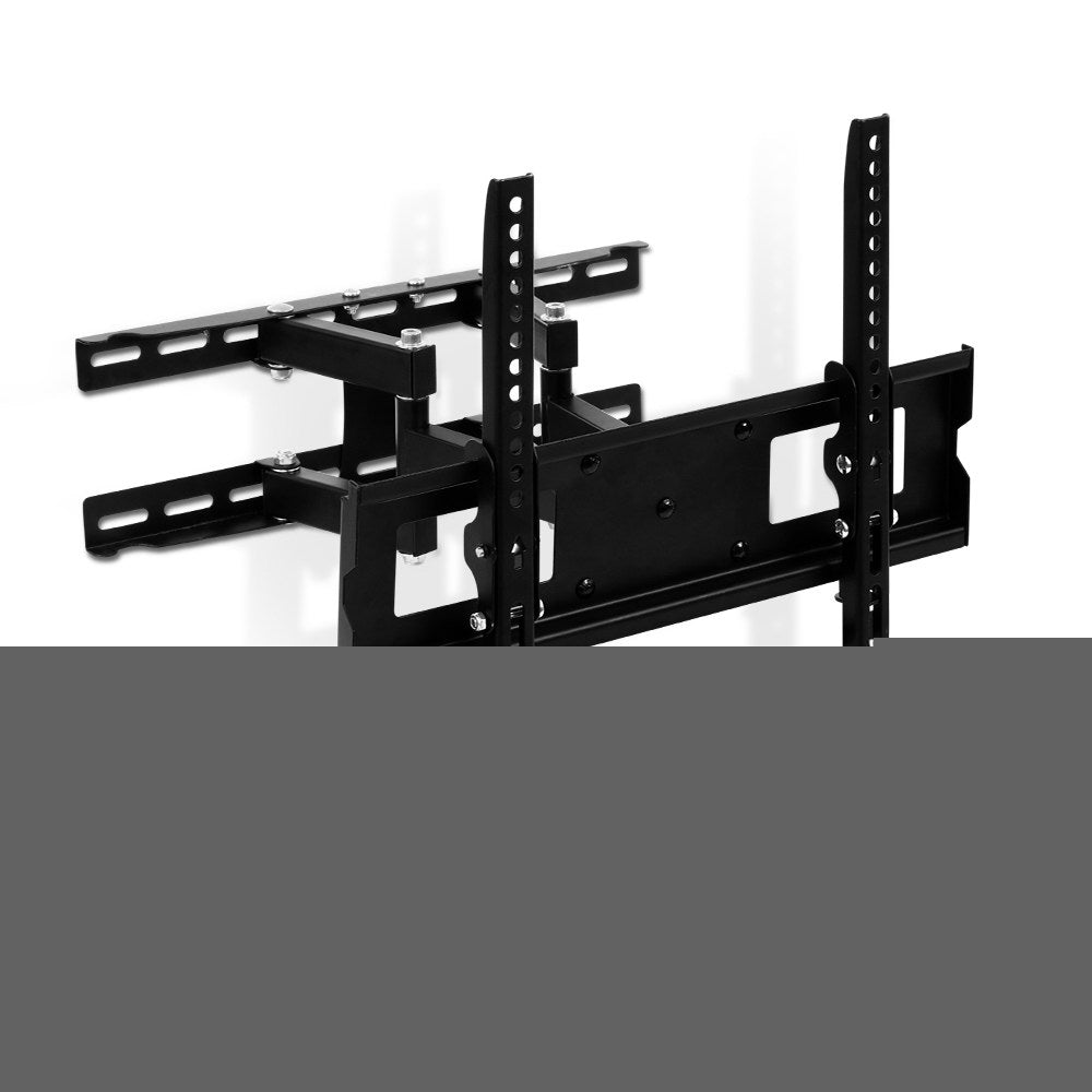 Black full-motion TV wall bracket angle view on grey wall with extended parallel arms and butterfly TV mounting plate visible