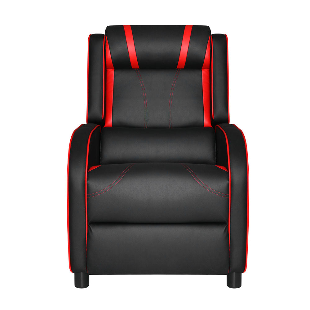 Black gaming recliner with red piping and neck roll headrest, front view on white background with footrest retracted