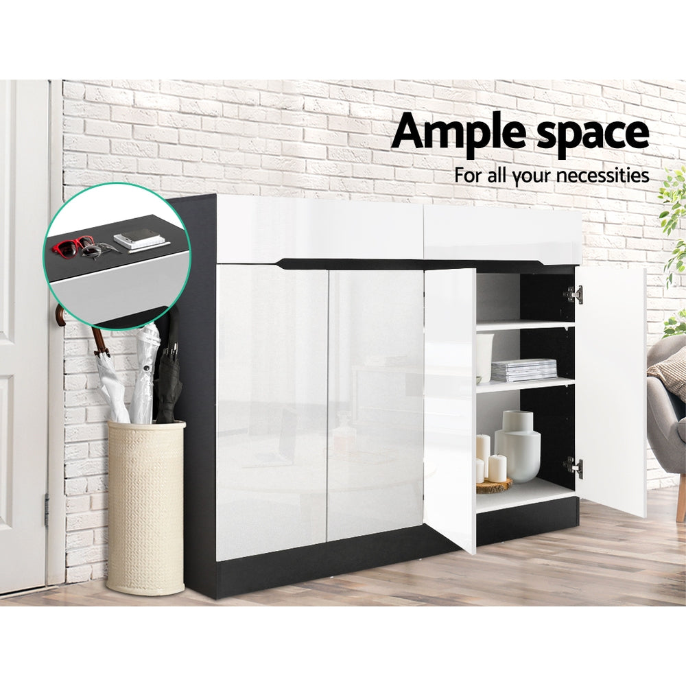 Shoe cabinet in room with brick wall right section open showing shelves with folded items and umbrella stand