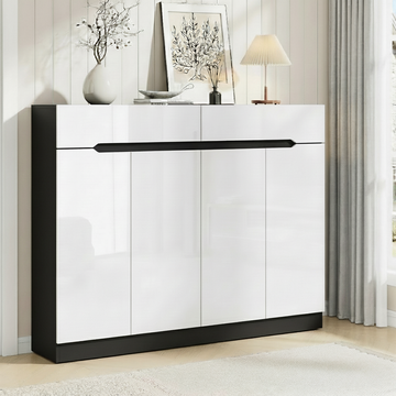 Black framed shoe cabinet 4 white high-gloss doors and 2 top drawers in room with plant