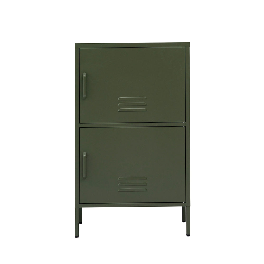 Dark green metal two-compartment stacked locker cabinet with left-side handles and vent slots on thin metal legs
