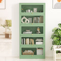 Sage green 5-door barrister display cabinet in room, books and decor visible through mesh doors, gold knobs, monstera beside