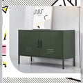 Green metal two-door locker cabinet with vent slots and bar handles in lifestyle room setting with abstract art poster behind