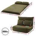 Green velvet 2-seater floor sofa bed three-quarter angle view in sofa mode showing cushion depth on white background