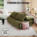 Green velvet floor sofa bed folded for storage showing 94cm x 68cm x 38cm compact dimensions and sturdy metal frame badge