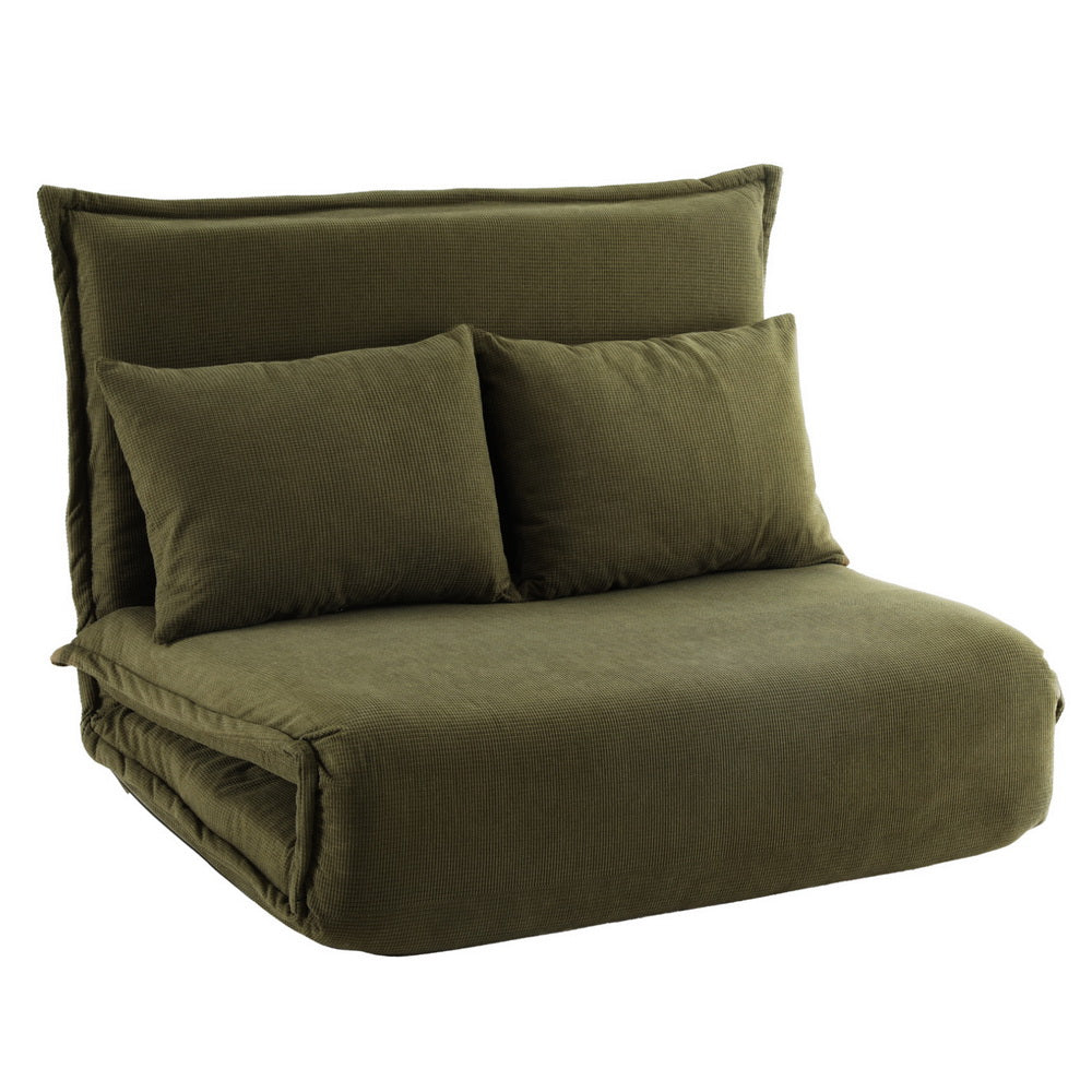 Green velvet 2-seater floor sofa bed hero angle view from right side showing thick cushion and adjustable back