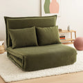 Green velvet 2-seater floor sofa bed in sofa mode on white rug in living room lifestyle setting
