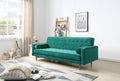 Green velvet tufted sofa bed in living room with wooden ladder shelf and artwork on wall