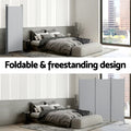 Grey 3-panel room divider foldable freestanding design showing single panel and folded zigzag in bedroom