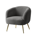 Grey boucle armchair with curved barrel back and gold metal legs, three-quarter angle view on white background