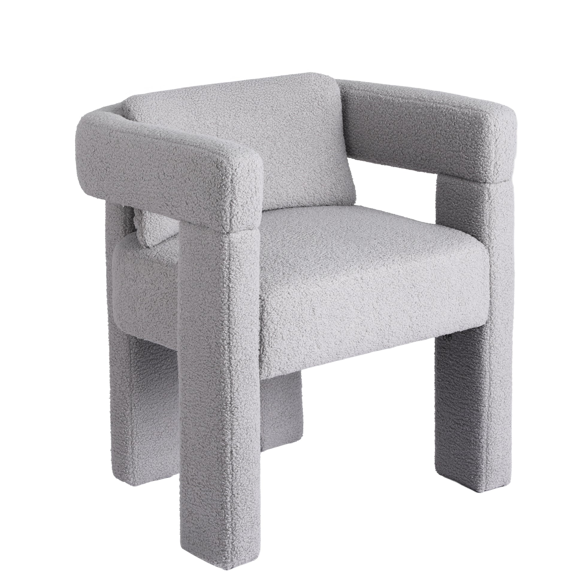 Grey boucle armchair in lifestyle setting, 150KG capacity badge, 16cm seat depth, text: Boucle fabric upholstery
