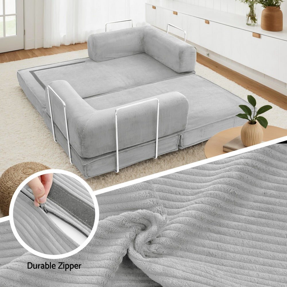 Grey corduroy folding sofa bed unfolded in living room with close-up of durable zipper closure on cover
