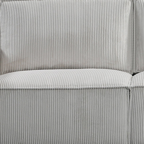 Close-up of back cushion on light grey corduroy sofa showing vertical ribbed texture