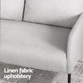 Close-up of light grey 2-seater sofa armrest and seat showing linen fabric texture, 