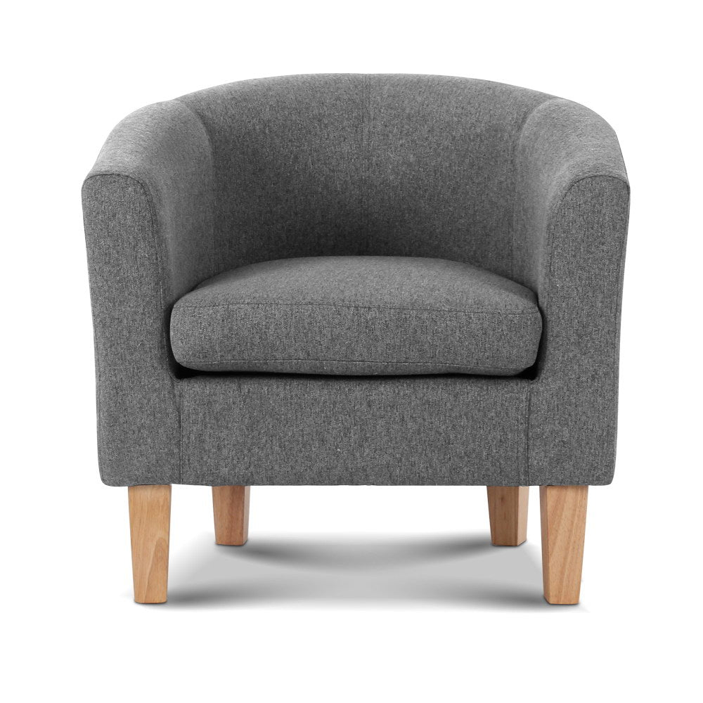 Grey fabric barrel armchair with rounded back and natural wood legs, front view on white background