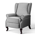 Grey fabric wingback recliner armchair with rolled arms and dark wood cabriole legs, angle view on white background
