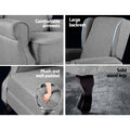 Grey fabric recliner armchair 4-panel feature close-up showing armrests, large backrest, plush foam seat, and solid wood legs