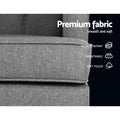 Grey fabric chair seat and arm close-up with Premium fabric, Wear-resistant, Breathable, Soft touch feature badges