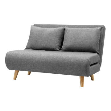 Grey fabric 2-seater sofa bed in sofa mode with two cushions and natural wood legs on white background
