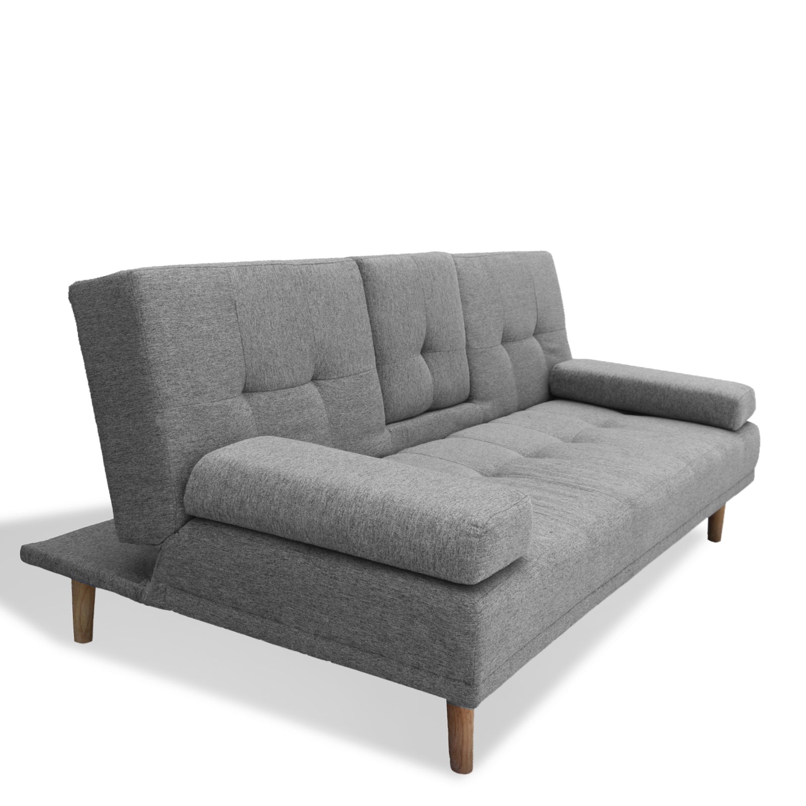 Grey fabric sofa bed in upright position viewed from angle showing tufted back and bolster armrests