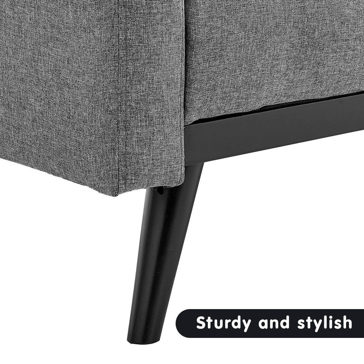 Close-up of grey fabric sofa bed lower frame and black tapered leg with Sturdy and stylish text label