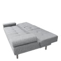 Grey fabric sofa bed fully reclined flat as sleeping surface with grey metal legs on white background