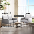 Light grey 2-seater sofa and matching chair in living room, 250kg and 150kg capacity labels, oval coffee table and window