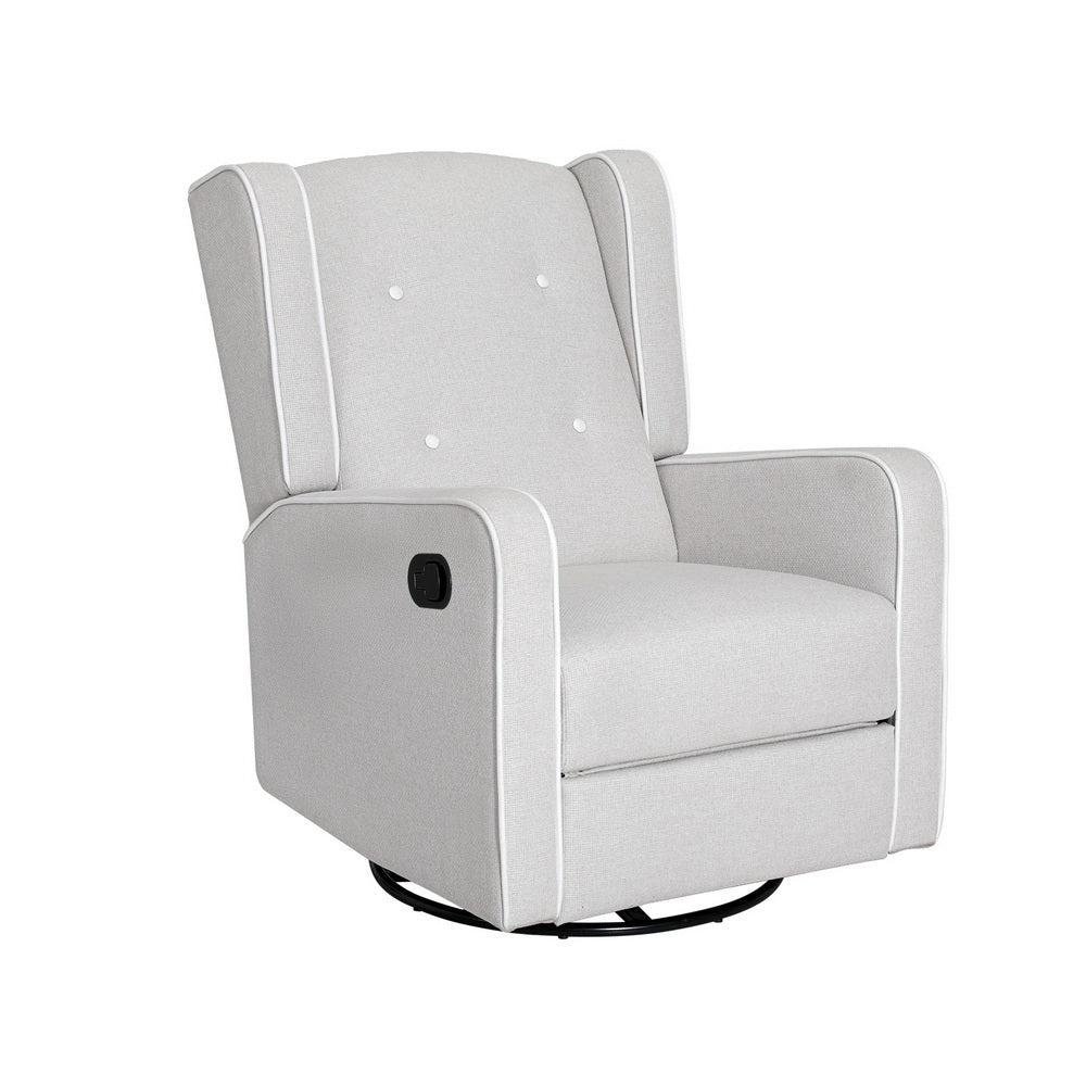 Grey fabric wingback swivel recliner, white piping and four buttons on backrest, black side handle, white background