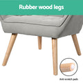 Close-up of grey fabric armchair rubber wood legs with anti-scratch pads callout and Rubber wood legs text banner
