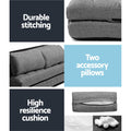 Grey linen floor lounger features panel showing durable stitching, two bolster pillows and high resilience cushion fill