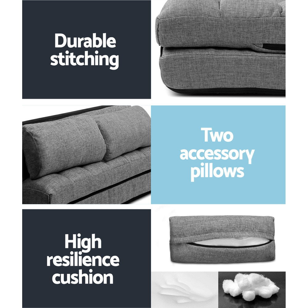 Grey linen floor lounger features panel showing durable stitching, two bolster pillows and high resilience cushion fill