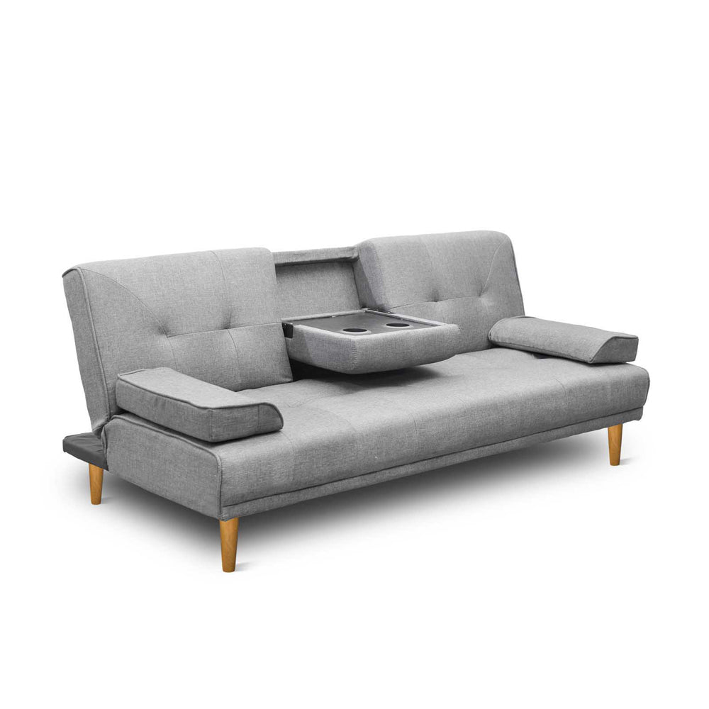 Light grey linen 3-seat sofa bed with fold-down cupholder tray open, two bolster arm pillows and wood legs