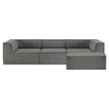 Dark grey modular L-shaped sofa with ottoman on white background, no visible legs, three interlocking sections