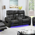 Dark grey leather 2-seater power recliner loveseat with diamond-quilted upholstery on white background