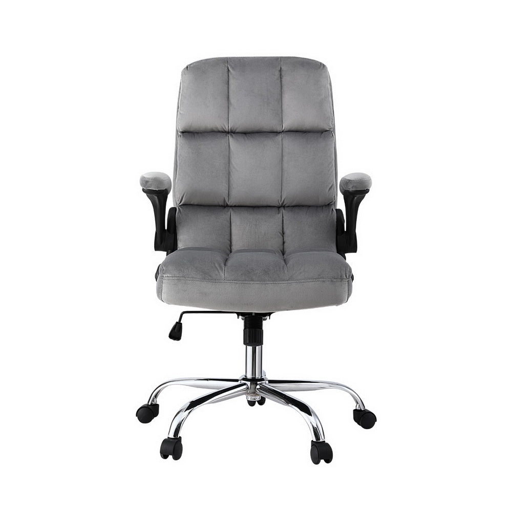 Grey tufted velvet high-back office chair front view with flip-up padded armrests and chrome five-star base on white