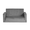 Grey velvet kids sofa bed in upright position on white background