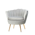 Light grey velvet scallop shell armchair with channel stitching and gold metal legs, angle view on white background