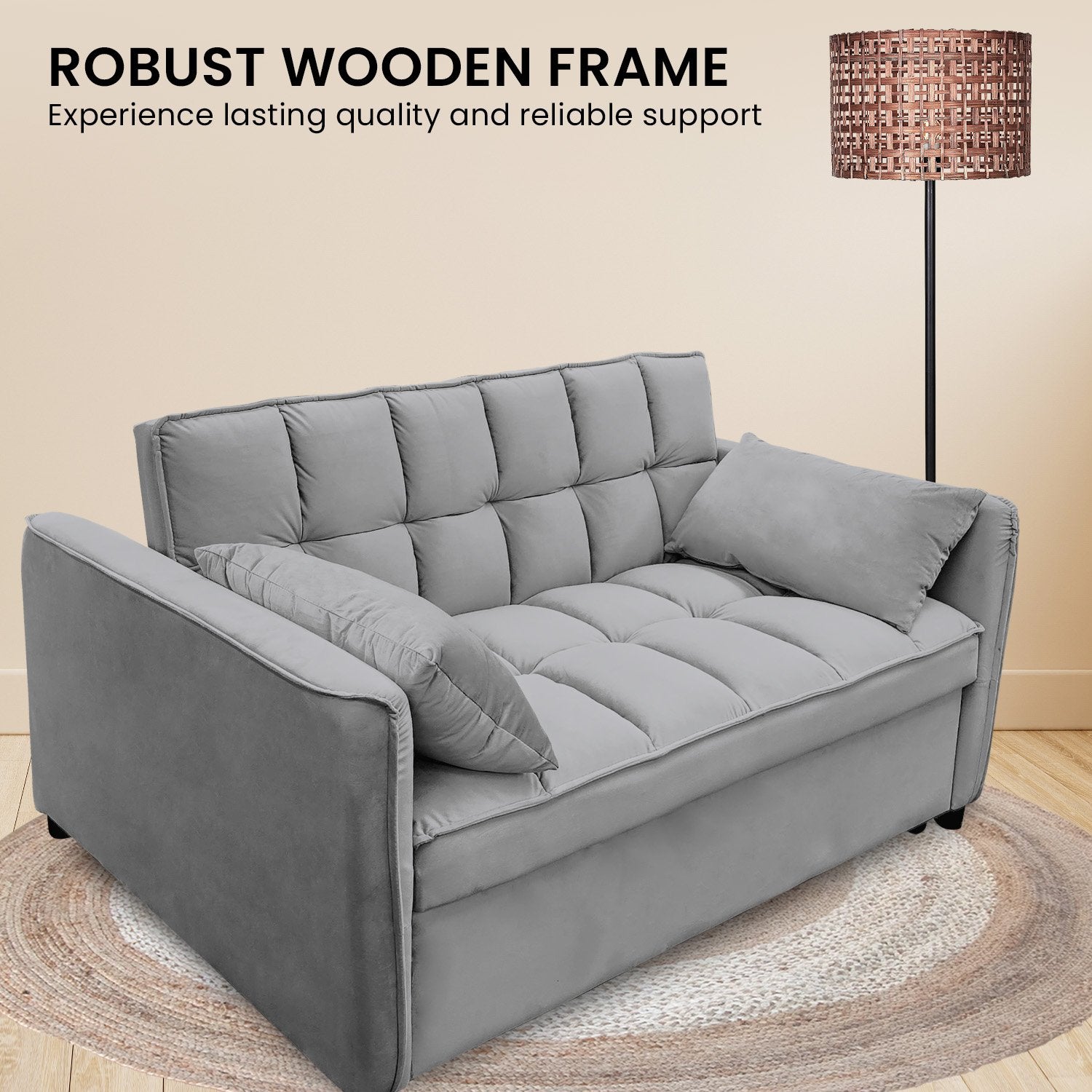 Close-up of grey velvet sofa bed tufted seat cushion with Tufted Upholstery feature text overlay