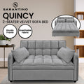 Grey velvet sofa bed in lifestyle room with floor lamp and rug showing Robust Wooden Frame text overlay