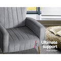 Grey velvet wingback armchair close-up of seat and armrest showing channel stitching and 18cm cushion depth callout